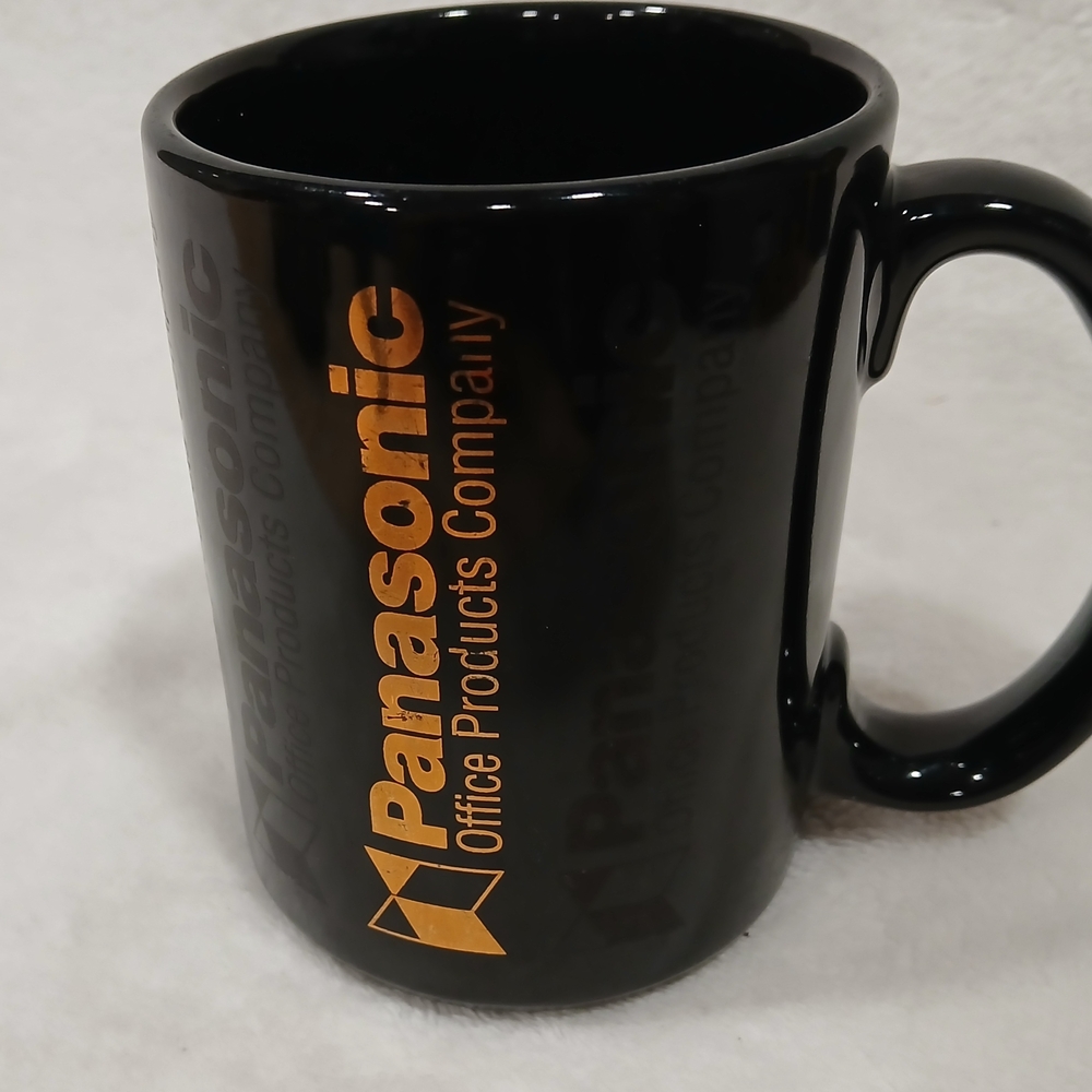 Vintage Rare Panasonic Office Products Company Black Coffee Mug Gold Logo 16 Oz